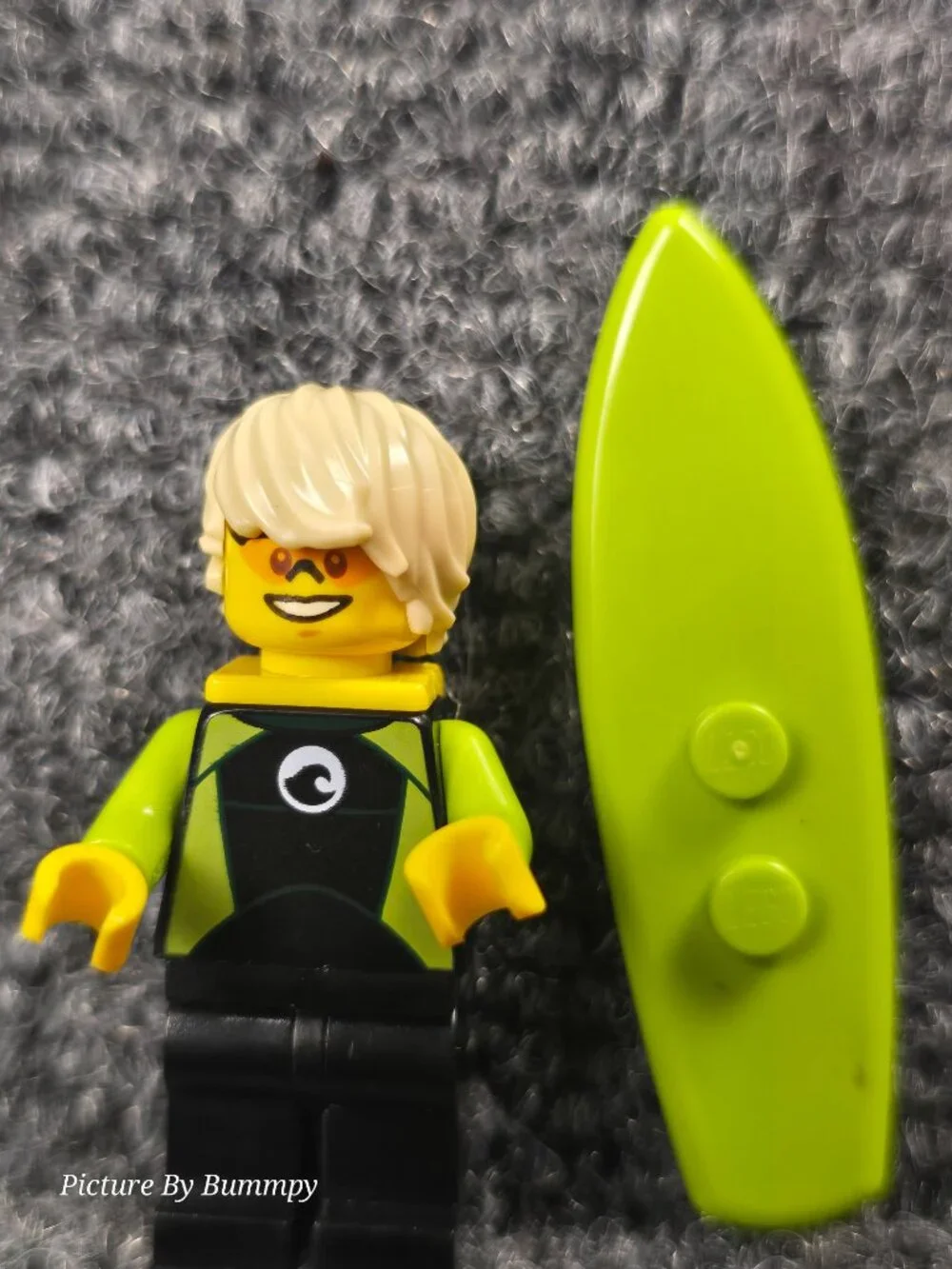 Lego minifigure is the Surfer